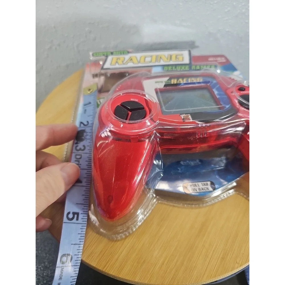 MGA Entertainment Super Auto Racing Handheld Electronic‎ Game LCD Red - New 1999